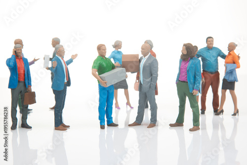 Miniature people in a busy urban scene with different activities and roles in a work setting