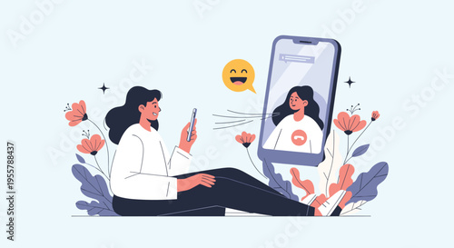 Young woman sitting on the ground with flowers around her while having a happy video call conversation on her smartphone.