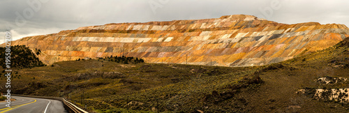 USA, NV, Ely.  Multi colored mine waste piles at large copper mine in the Nevada desert.  
