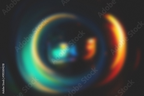 Light leakage overlay effect with blurred colorful light, retro film on a black background