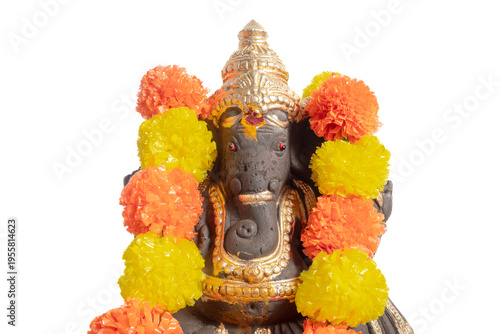 Ganesha idol adorned with a bright orange and yellow floral garland for Hindu worship and celebration.