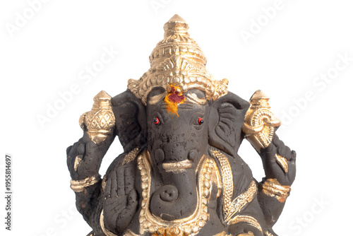 An elegant Ganesha statue adorned in gold, a traditional Hindu deity statue for worship and decoration.