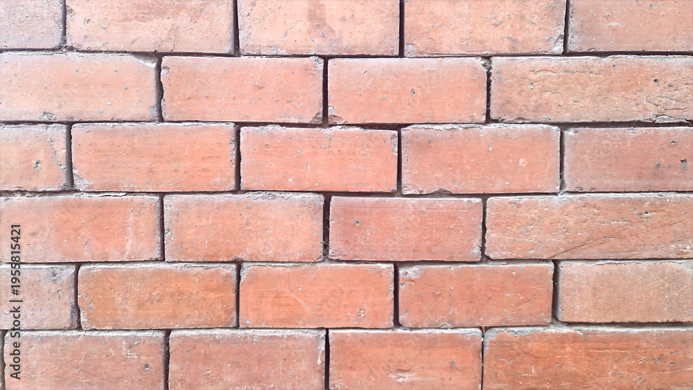 Obraz premium Rough textured red brick wall background pattern
