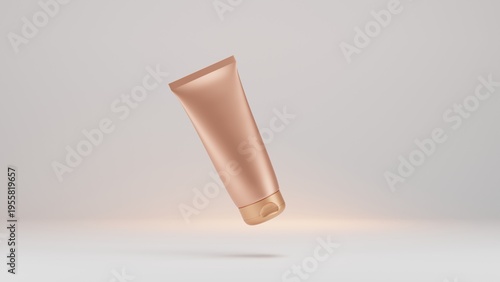Fotografia Mockup golden tube with cosmetic cream isolated on white background