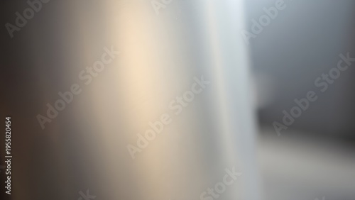 couter. Metal surface transitioning from rough matte to glossy finish with light reflections. safety posters, maintenance manuals, designed for precision metalworking and fabrication facilities.