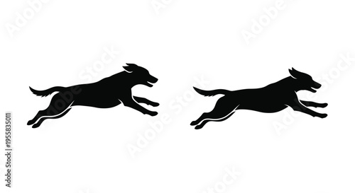 Two dogs in mid leap showcasing dynamic motion black silhouette