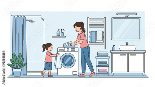Mother and her little daughter doing laundry together in a bright bathroom with a washing machine and towels for domestic lifestyle themes.