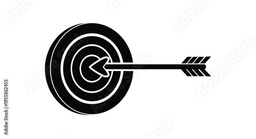 An arrow hitting the bullseye of a target black silhouette