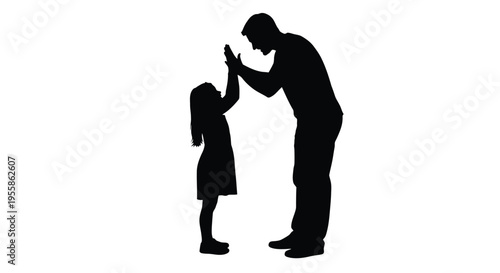 Father and daughter sharing a high five a tender moment silhouette