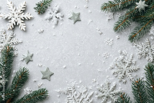 Festive winter background with snowflakes, stars, and fir branches.