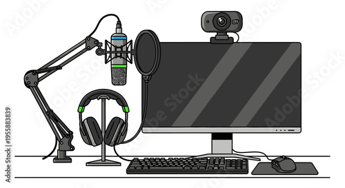 Computer with microphone and headphones on desk.