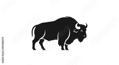Black silhouette of a bison standing.