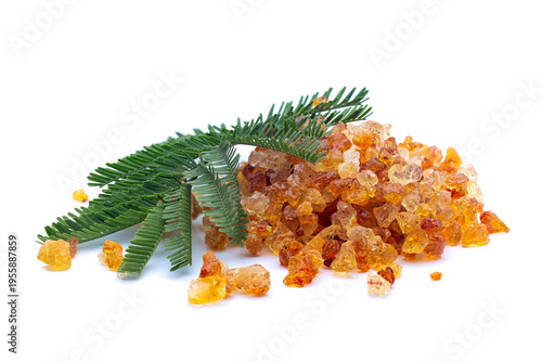 Gum Arabic Resin with Acacia senegal Leaf on White Background