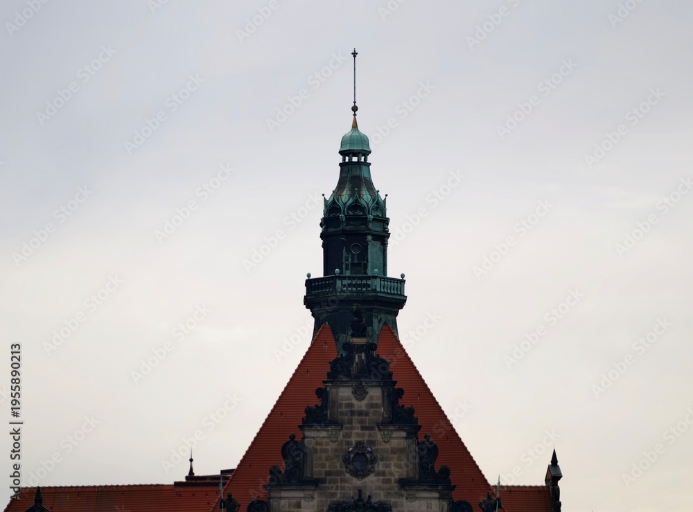 Fototapeta premium Skyline drawing mood. Overcast sky frames student sketching building ornament and spire silhouette