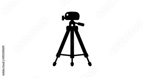 Silhouette tripod with camera capturing a moment showcasing stability and precision tools for