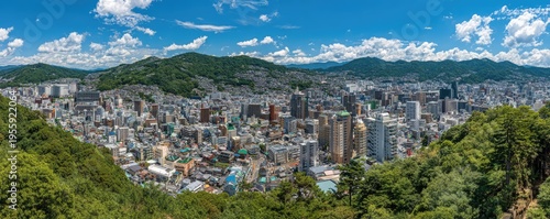 Panoramic Cityscape of Busan, South Korea with Lush Greenery.
