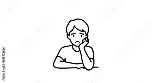Boredom and Frustration: Young Man Sitting with Hand on Chin, Looking Downcast