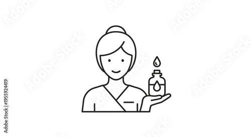 Spa Therapist Holding Essential Oil Bottle with Droplet