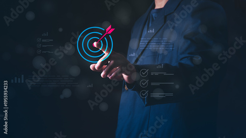 Foto Concept of achievement, success, performance tracking, data analysis, and hitting the corporate objective, Businessman pointing at the target bullseye for business goals and marketing strategy