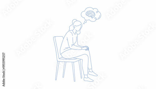Person sitting on a chair thinking.