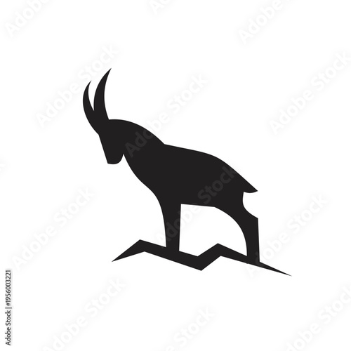 Black Silhouette of an Ibex or Mountain Goat Standing on Abstract Jagged Terrain, Minimalist Vector Illustration