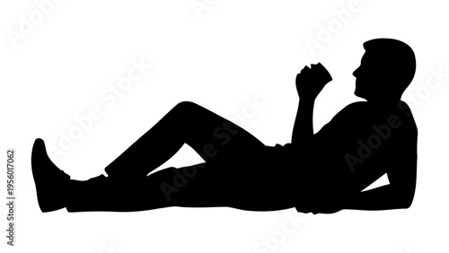 Silhouette of a man lying down and drinking from a cup for relaxation and leisure concept