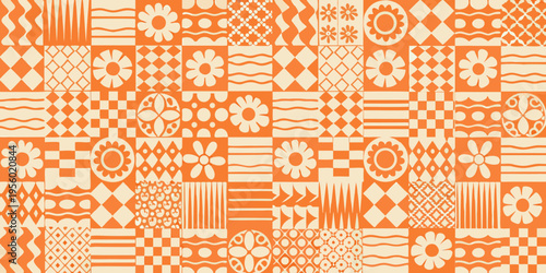 Geometric floral pattern a tiled arrangement of orange and beige motifs