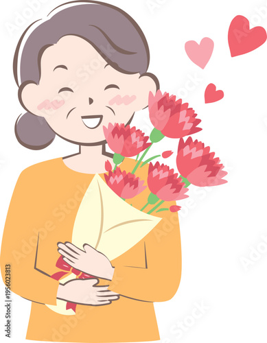 母の日にカーネーションをもらうお母さん