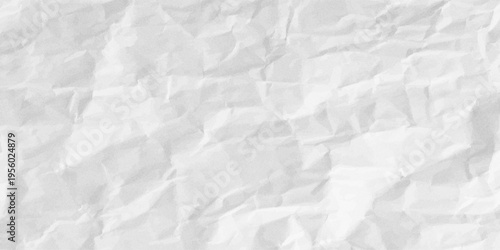 A sheet of white paper that is slightly crumpled or wrinkled  with shading indicating texture and creases.