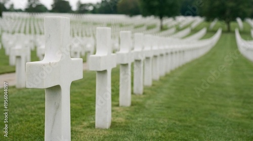 Field of white crosses in a cemetery on Memorial Day  
