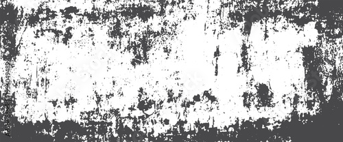 Distressed grunge texture with dark grey splatters and scratches on a white background