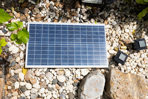 Solar panels in a rock garden.