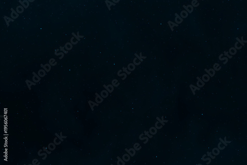 Starry night sky. Dark blue galaxy space background. Glowing stars in space. New Year, Christmas and Celebration background concept.