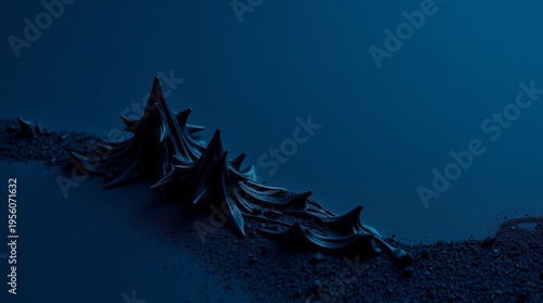 A row of sharp, cascading black crystalline structures extends across rocky terrain in deep blue tones, evoking frost or