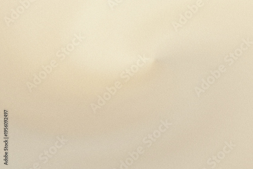Photos A close-up view of a textured beige fabric surface with subtle graininess and li