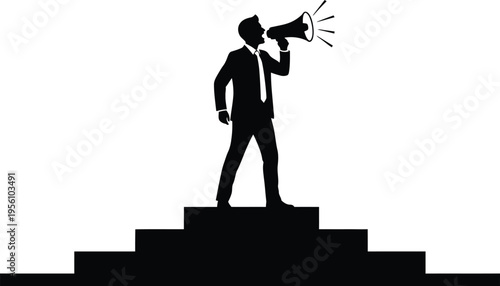 Businessman standing on steps with megaphone