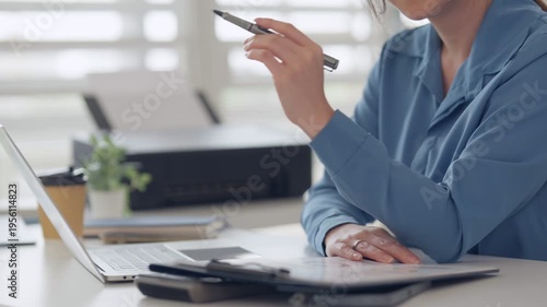 Asian business people celebrating success teamwork office collaboration high five achievement partnership