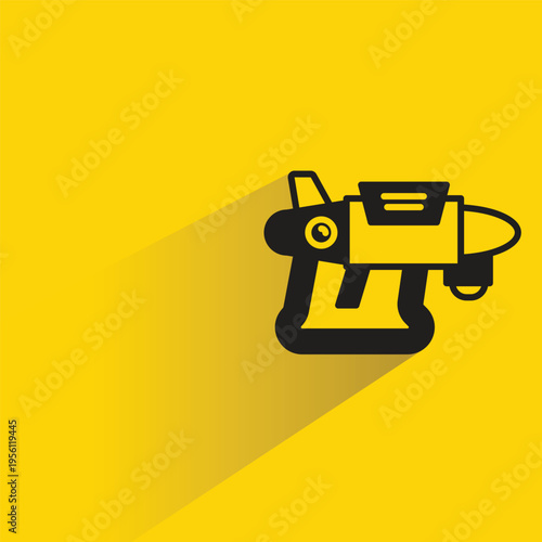 space gun icon with shadow on yellow background