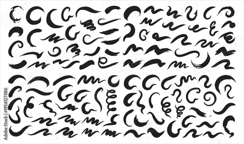 A collection of various black squiggles and abstract shapes on a white background