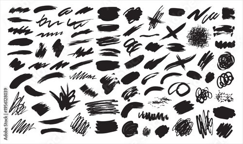 A collection of various black brush strokes and marks on a white background