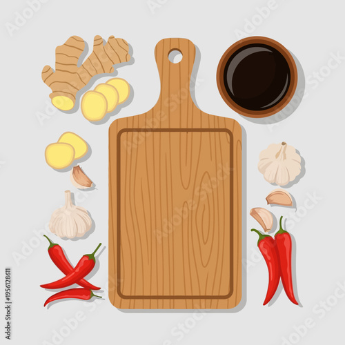 A wooden cutting board surrounded by fresh ingredients including ginger, garlic, chili peppers, and a bowl of soy sauce, ready for cooking.