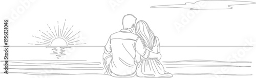 Loving couple sitting together on beach watching sunrise peacefully