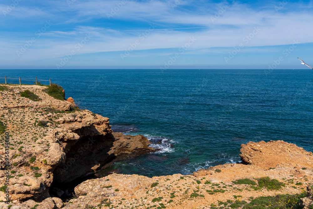 Fototapeta premium Beautiful sea landscape rocks and stones, caves and grottoes, Las Rotas nature reserve Denia, Alicante Spain Mediterranean sea