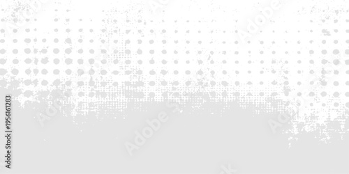 Abstract grey backdrop with a grungy texture and dot patterns, creating a visually compelling surface for any design or digital project.
