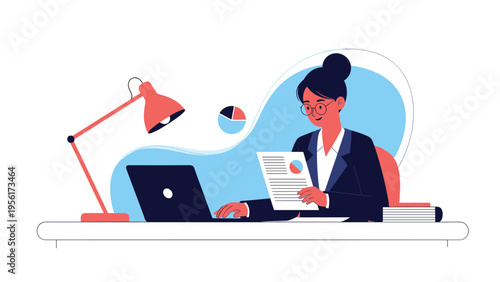 Focused businesswoman working at her office desk analyzing reports and growth charts on her laptop with a bright desk lamp.