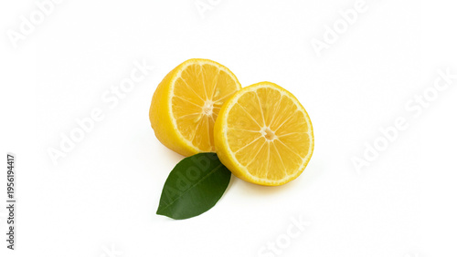 Vászonkép Two halves of a sweet lemon (Citrus limon) with a green leaf, isolated on white