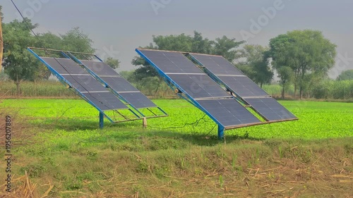 solar power plant in a farm with grass background.