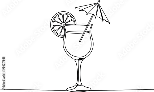 A refreshing drink garnished with citrus and an umbrella for a sunny day
