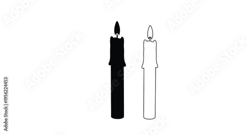 Two candles one dark and one light in stark silhouette