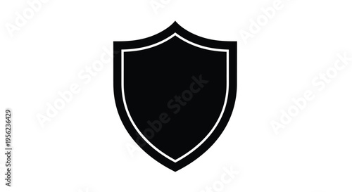 A black shield design against a white background a bold silhouette